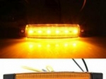 "LED pentru semnalizarea    dimensiunilor , alimentat la curent  12 V,forma  peste ,culoare portocaliu"