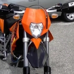 Carena si far fata pentru motociclete, portocalie, cu faza scurta si lunga – Model universal pentru ENDURO / Trail / Streetfighter